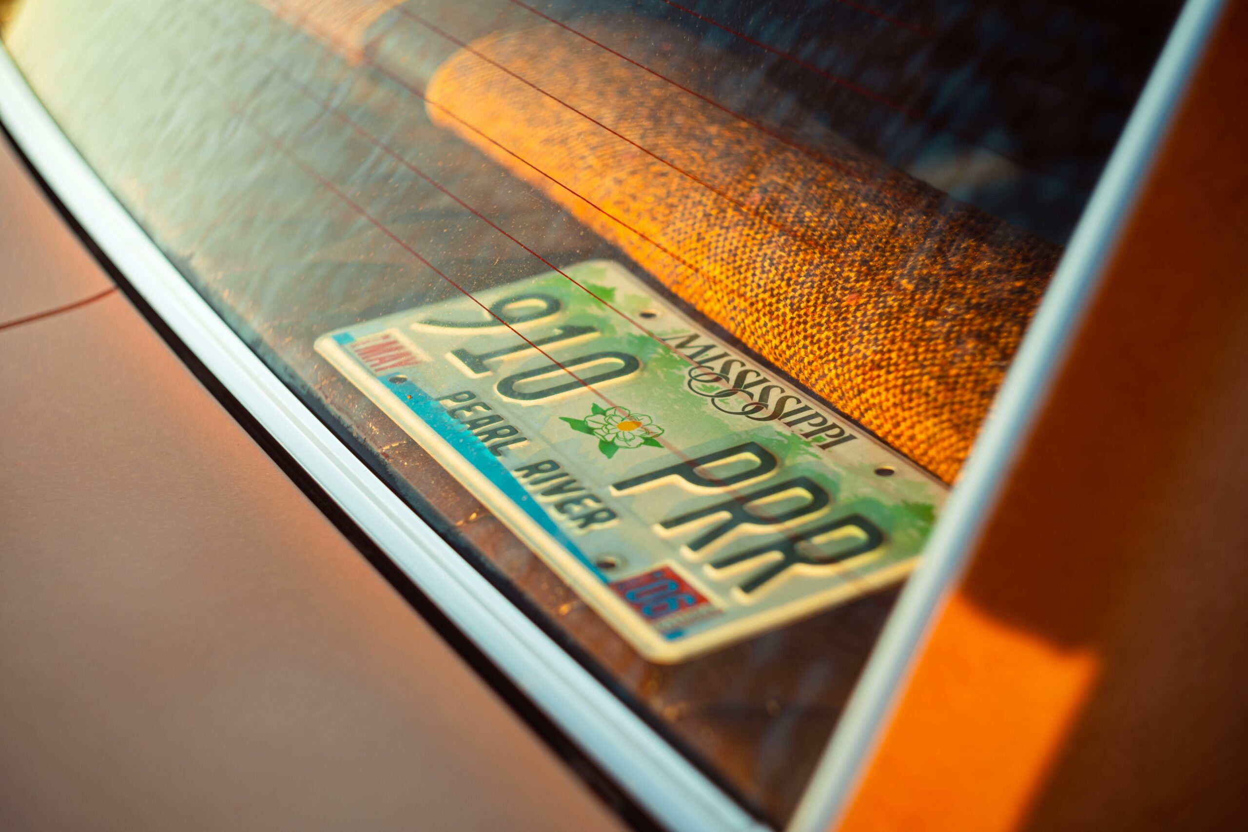 A close up of a license plate on a car
